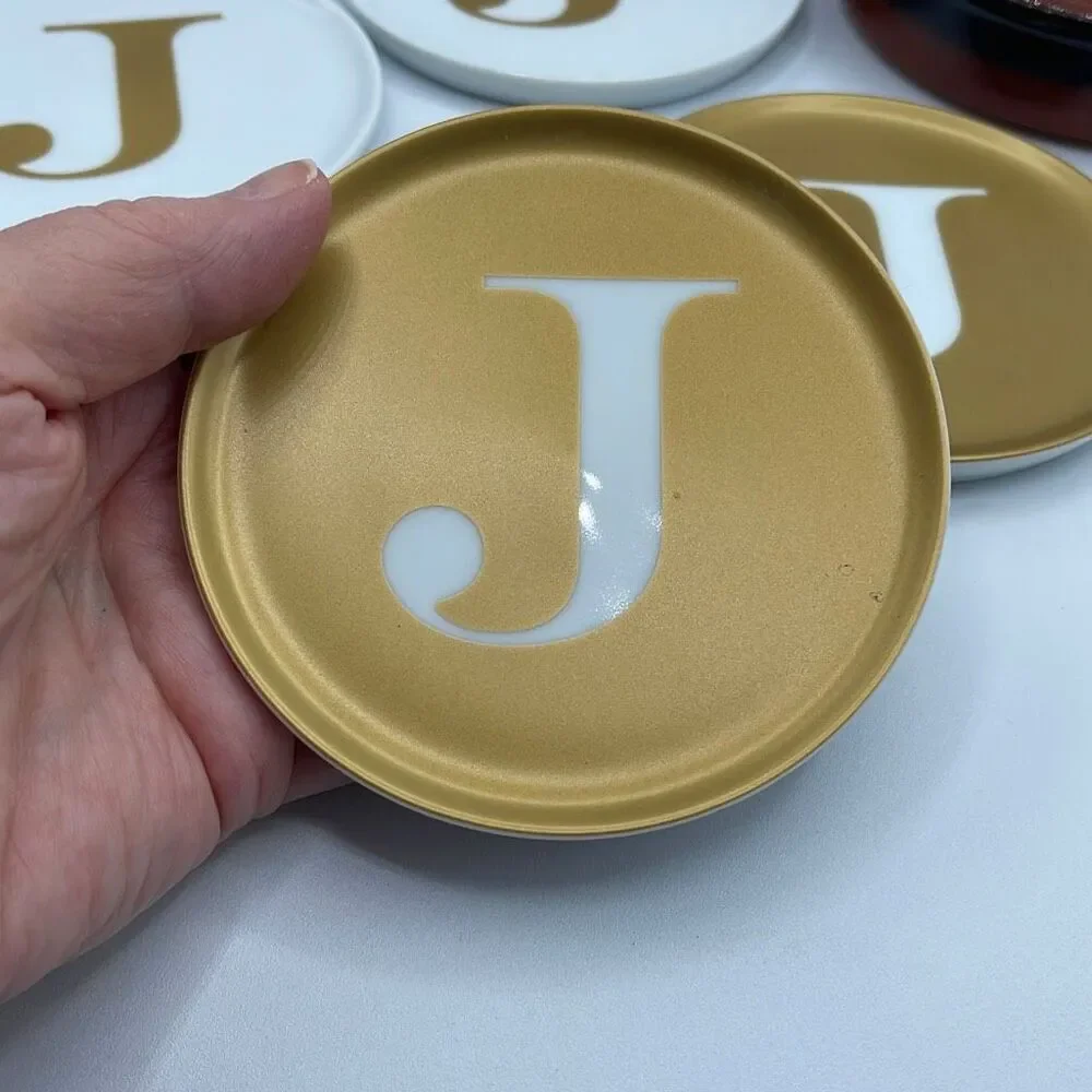 The Cellar for a Macy’s “J” coasters and wine bottle holder.